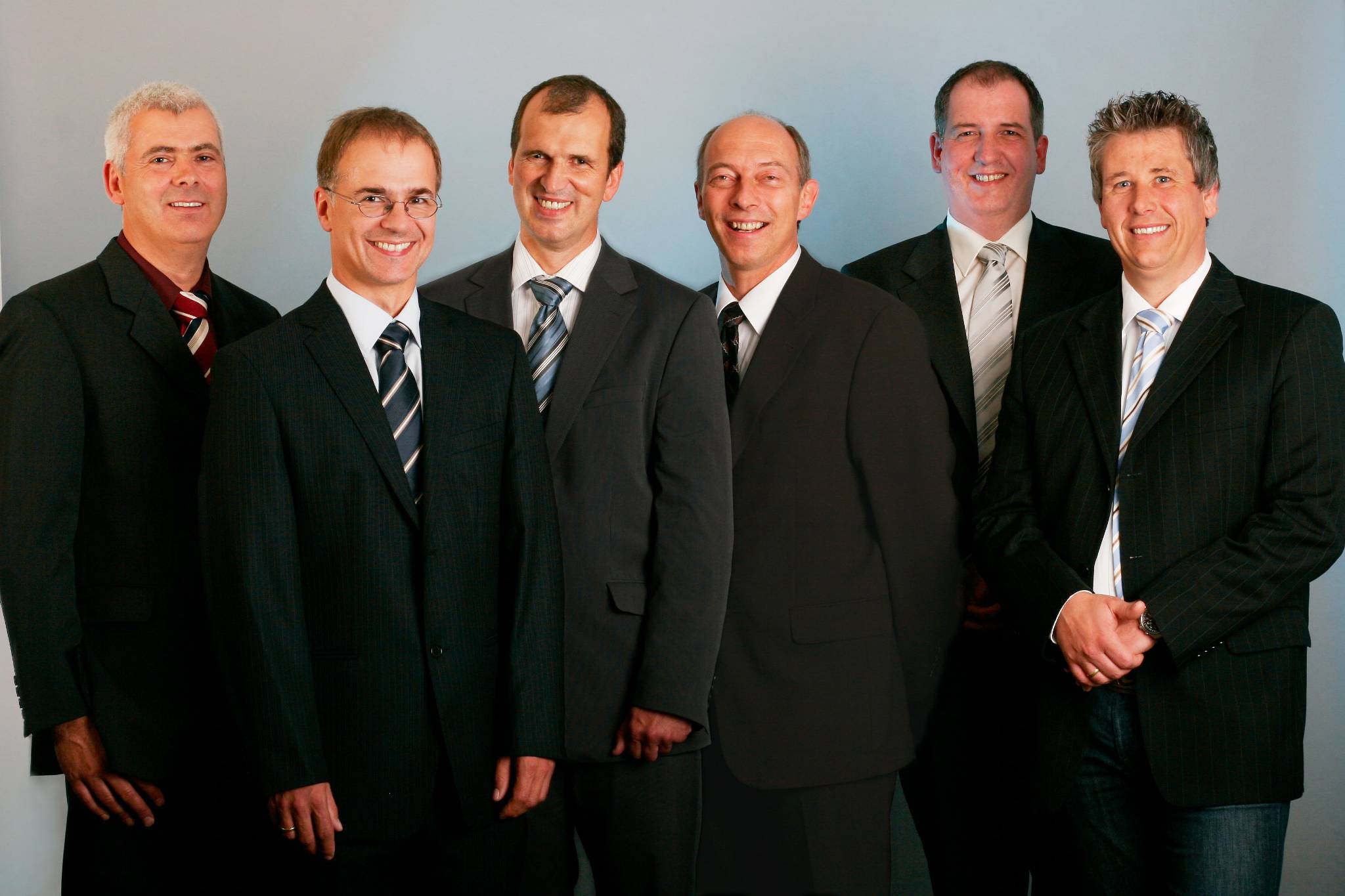 Gruppenportrait Geschäftsführung